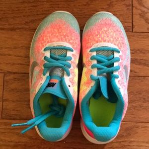 Cute Nike shoes (Great condition to have been through 2 little sweethearts)
